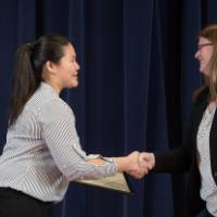 Professor shaking hands with the GSA President